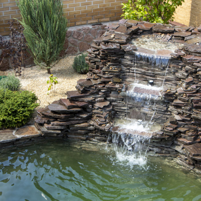 fountain with two overflows, in antique style. Using natural materials such as wild marble, slate, granite and basalt.